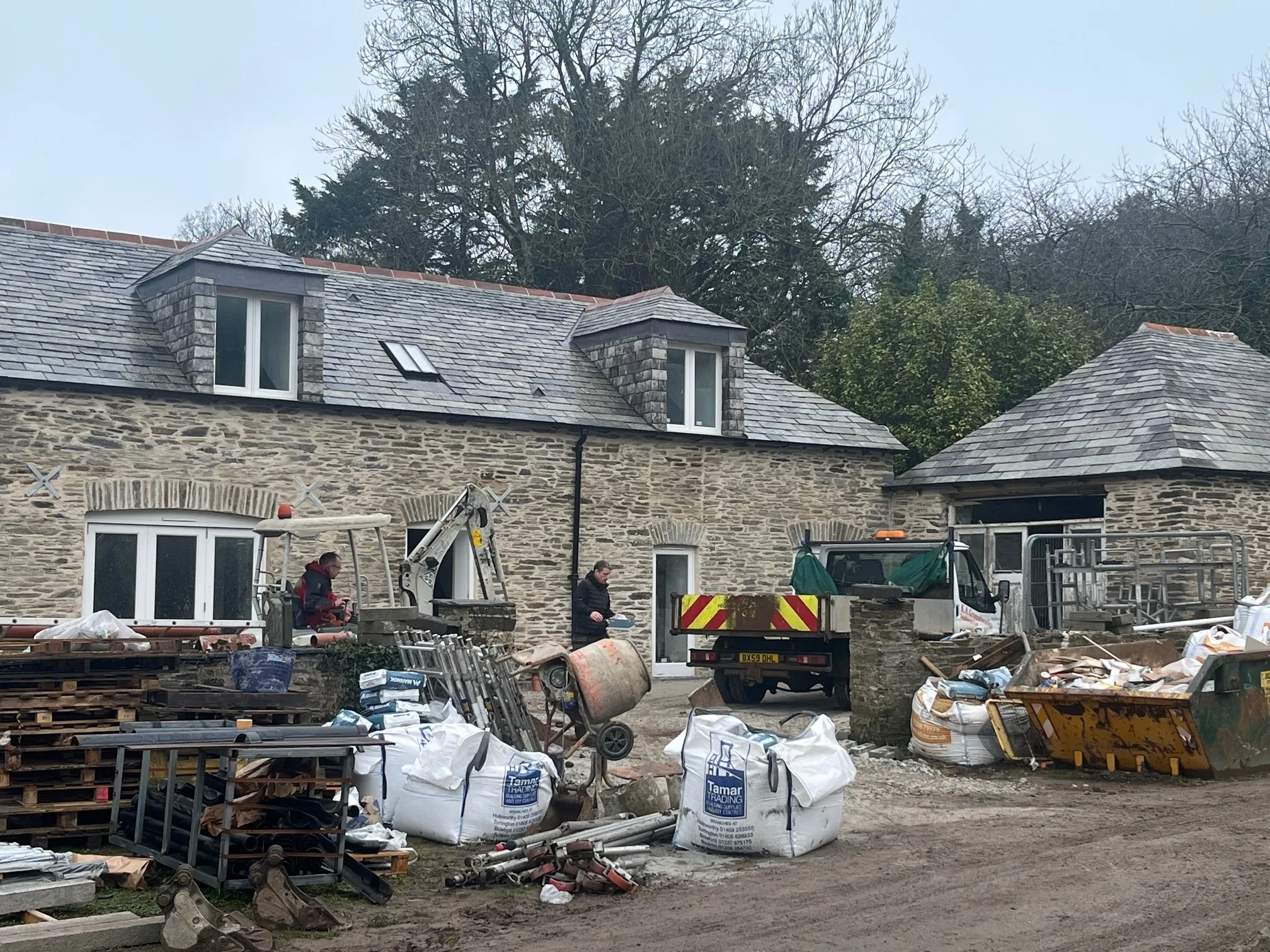 Stone-built cottage with a slate roof and dormer window in Cornwall